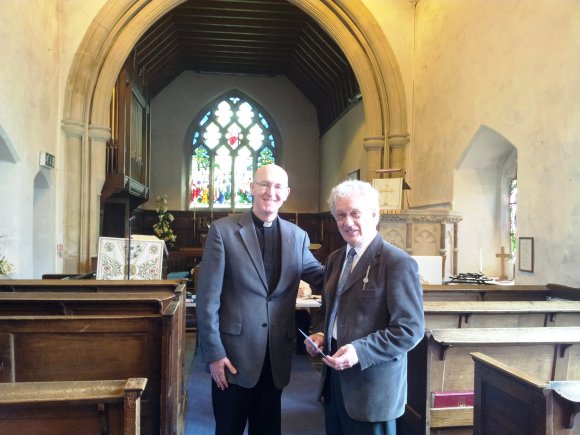 The Rev. Dr. Peter Hooper thanks Maurice McMorran upon his retirement as Treasurer of All Saints.