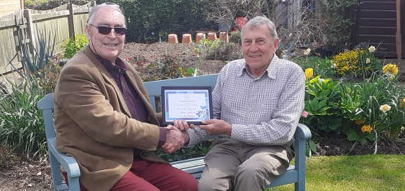 Brian Anderson receiving his certificate from our chairman Mike Newcombe